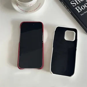 Detail view of minimalist solid color leather phone case, soft interior, precise cutouts.