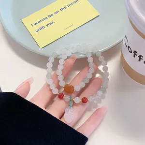 Elegant Chinese style multi-layer Tianshan jade gemstone bracelet with cute leaf pendant.