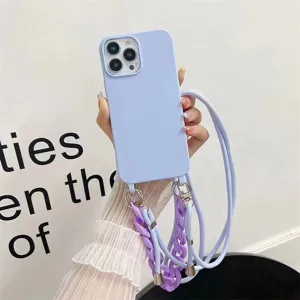 Detailed view of pastel purple silicone phone case with matching chain strap for iPhone.