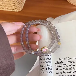Exquisite double-layer natural agate beaded bracelet detail view featuring elegant metal charms.
