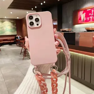 Pink silicone phone case with acrylic chain strap for iPhone, stylish hands-free accessory.
