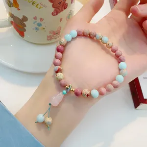 Sweet fresh stone bracelet with pink crystal gourd pendant, minimalist design for women.