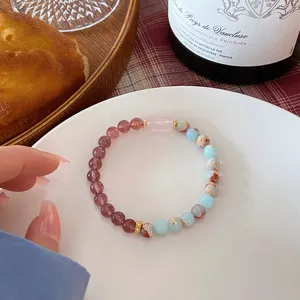 Handcrafted gemstone beaded bracelet with strawberry quartz and pink crystal for women detail view