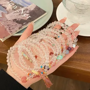 Bracelet double couche en cristal clair avec pompon lotus en cristal rose, bijoux doux et frais.