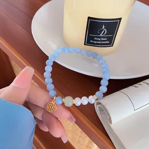 Refreshing blue natural stone bracelet with pearls and gold pendant for sweet fairy style fashion.