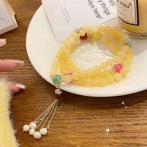 New Chinese style natural agate double layer bracelet with gold silk jade and tassels.
