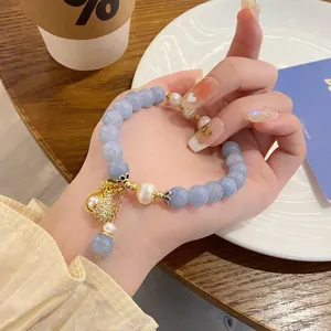 Elegant blue natural stone beaded bracelet with pearl and gold pendant, sweet fairy style jewelry.