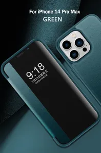Grüne Leder Flip Schutzhülle für iPhone 14 Pro Max mit Sichtfenster und eleganter Textur.