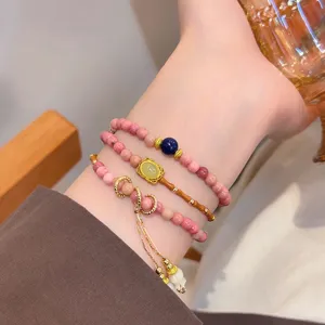 Neues chinesisches Retro Perlen Armband mit Quasten Anhänger für modische Damen Accessoires.