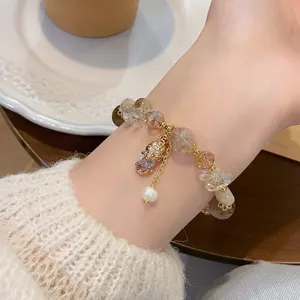 Chic lucky Pixiu rutilated quartz and sunstone crystal bracelet with pearl charm for women detail.