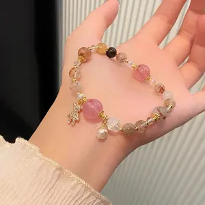 Sweet fairy style crystal bracelet with cute bear pendant, rutilated quartz and strawberry crystal.