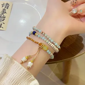 Neues chinesisches Retro-Mehrschicht-Stein-Bodhi-Armband mit dekorativem Blumenquasten.