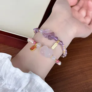 Natural crystal woven double bracelet with amethyst pixiu and rose quartz gourd charms.