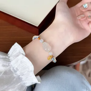 Ethnic woven bracelet with jade pixiu charm, handmade sweet adjustable jewelry for women.