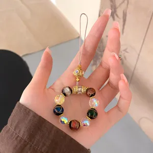 Palace style multi-color glass bead phone charm and keychain, elegant handcrafted bag pendant.