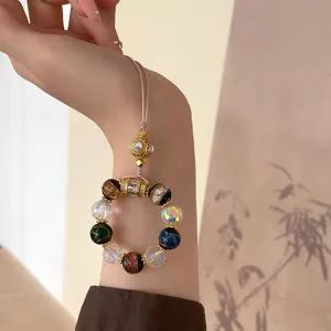Palace style multi-treasure glass beads phone charm strap, retro gemstone accessory detail