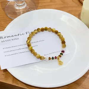 Elegant natural yellow crystal tiger eye gemstone bracelet with lucky gourd pendant jewelry.