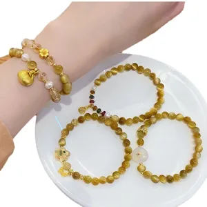 New Chinese style yellow crystal tiger eye stone beaded bracelet set with gold ingot pendant.