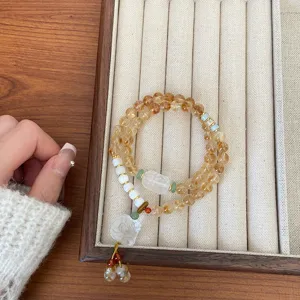 Bracelet en cristal de citrine naturelle double tour avec pendentif lion style chinois.