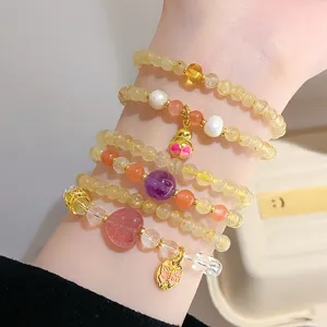 Natural crystal gemstone beaded bracelet stack with cute charms for women jewelry detail