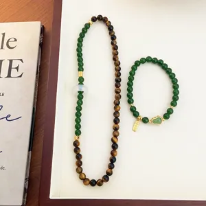 Ensemble de bracelets en œil de tigre naturel et perles vertes, design chinois de niche unique.