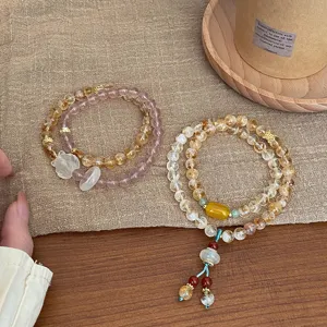 Bracelet double en cristal naturel avec pendentif renard mignon et pompon pour femmes.