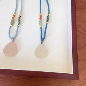 Natural agate buddha pendant sweater chain, long woven blue rope necklace for women.