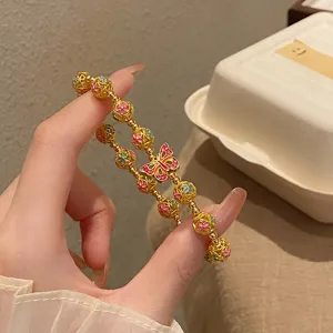 Série Palais vintage ethnique émaillé cloisonné doré bracelet de perles papillon détail