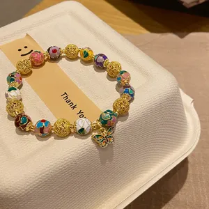 Bracelet de perles cloisonné vintage avec pendentif papillon, bijoux dorés élastiques ethniques.