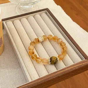 Bracelet en cristal de citrine naturelle et quartz fumé de luxe avec des perles d'entretoise.