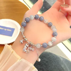Chic blue cat charm bead bracelet detail shot, elegant vintage style jewelry for daily wear.