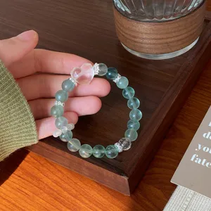 Natural mint green fluorite bracelet with crystal heart charm, sweet beaded jewelry.