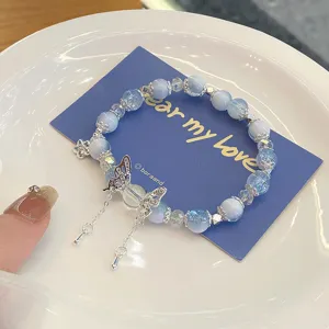 Blue crystal beaded bracelet with cute butterfly pendant, sweet style jewelry for daily wear.