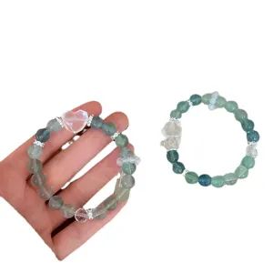 Natural mint green fluorite crystal bracelet with cute heart and bear charms for women daily wear.