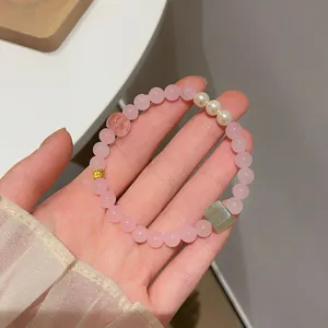 Elegant pink crystal bracelet featuring pearls and green jade beads, sweet style jewelry for daily wear.