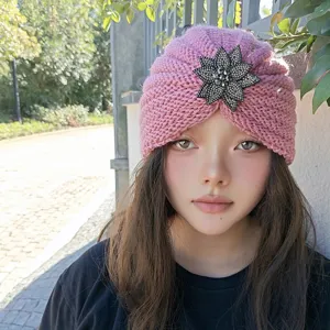 Pink knitted turban hat with sparkling rhinestone brooch, warm winter beanie for women.