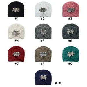 Rhinestone flower knitted turban hat for women, warm winter beanie in multiple solid colors.
