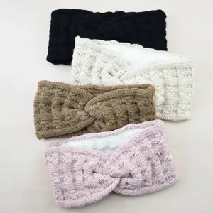 Thick fleece-lined knit headband with a stylish cross design, perfect for winter outdoor sports.