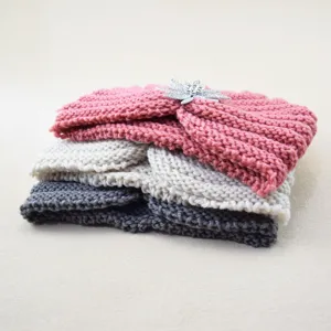 Detailed close-up shot of the rhinestone embellished knitted headband set in multiple colors.