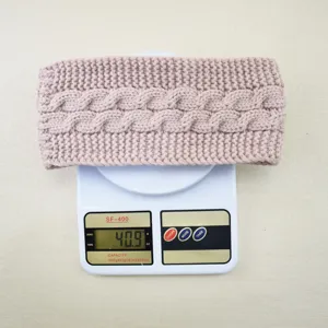 Close up detail of cable knit fleece headband warm winter fuzzy texture weight display