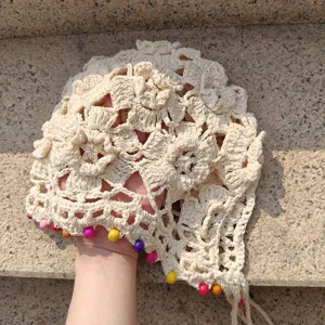 Handmade crochet beanie hat with colorful wooden beads and tassels, hollow knit detail.