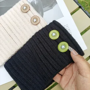 Knit ear warmer headband with elegant pearl buttons, cozy ribbed design for daily winter wear.