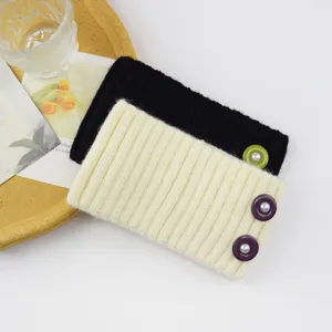 Knitted ribbed headband detail with pearl button, cozy winter ear warmer and face washing hair band.