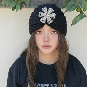 Black knit turban hat with rhinestone flower brooch, warm winter slouchy beanie for women stylish.