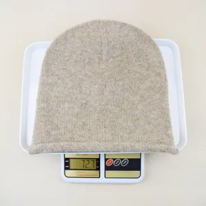 Solid color roll-edge knit beanie hat, minimalist warm winter slouchy skull cap for daily wear.