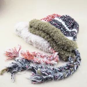Plush knit beanie hat with tassel braids, warm earflap pullover hat for women winter.
