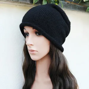 Black knitted beanie hat, solid color slouchy pullover cap for winter, warm windproof casual style.