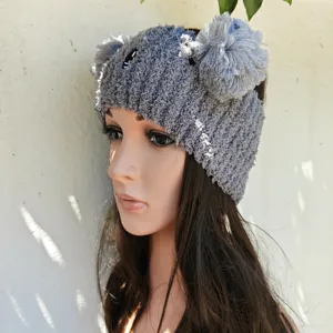 Grey plush knitted headband with fluffy pom poms and animal embroidery for cozy daily face wash.