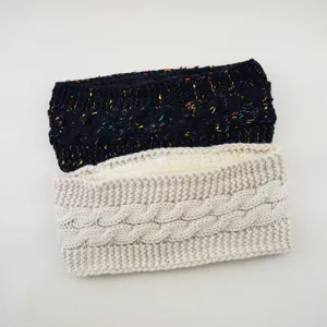 Detailed view of winter cable knit headbands with plush lining, warm ear warmer hair accessories.