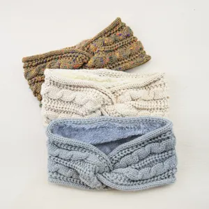Detailed close-up view showing the soft fleece lining and textured knit pattern of warm headbands.